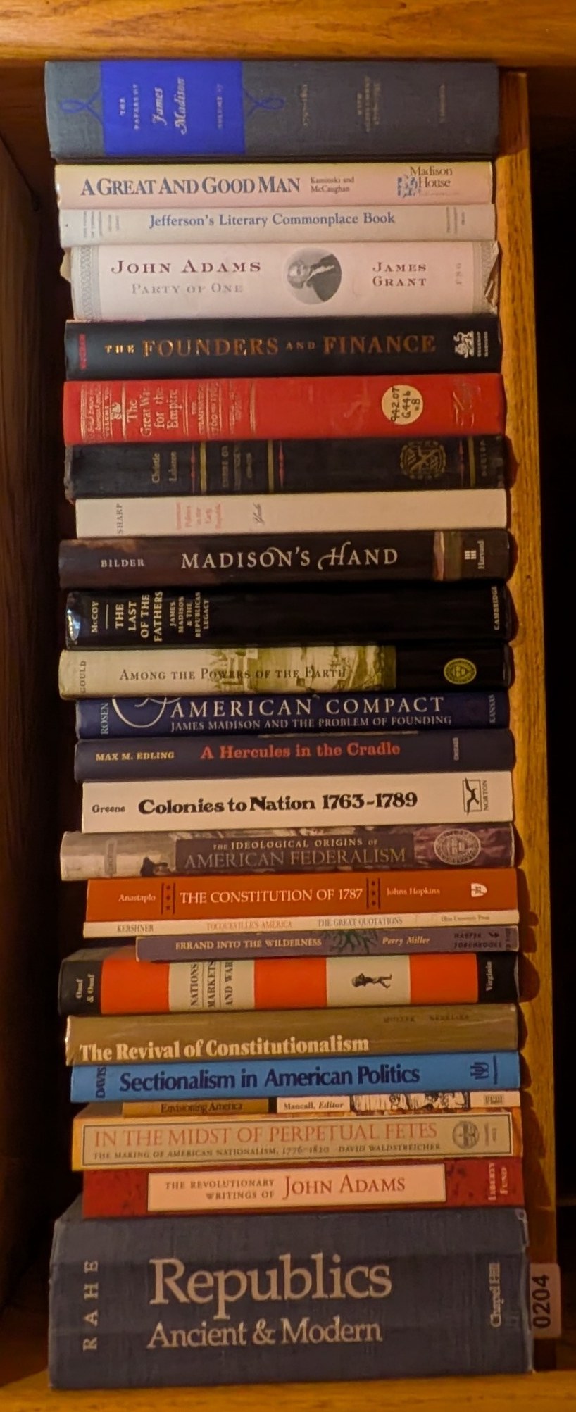 Books on Shelf 204, shown sideways to include the entire shelf