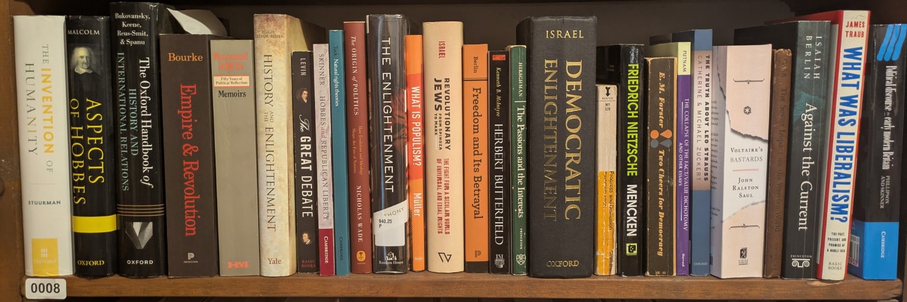 Photograph of Shelf 8 with readable book spines.