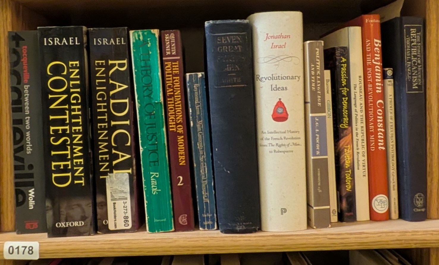 Photograph of Shelf 178 with readable book spines.