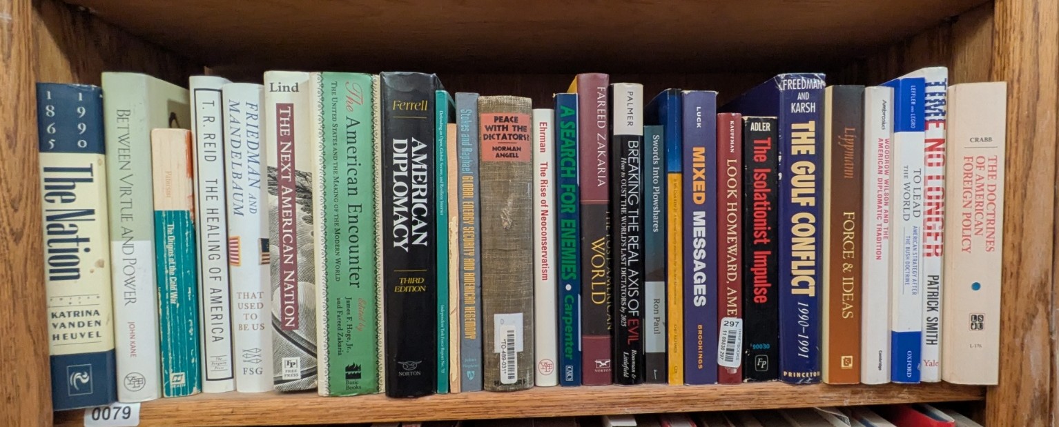 Photograph of Shelf 79; books are listed in top-to-bottom order alongside the photograph.