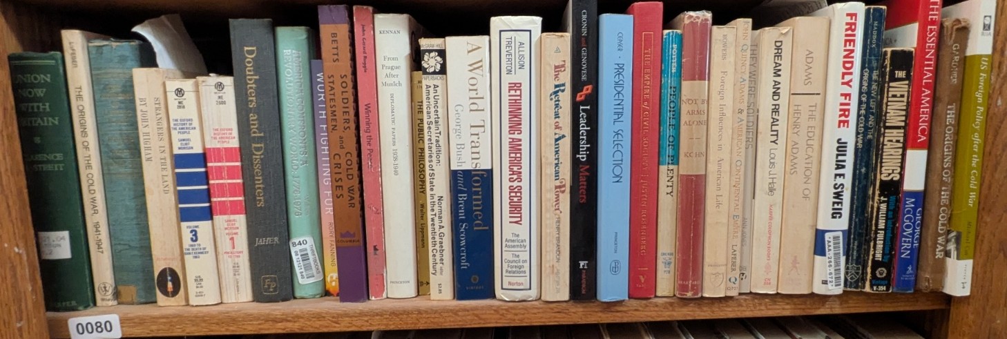 Photograph of Shelf 80; books are listed in top-to-bottom order alongside the photograph.