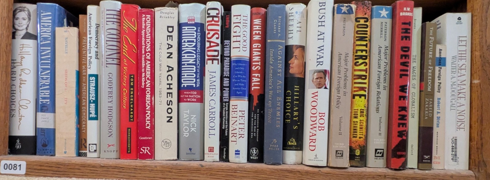 Photograph of Shelf 81; books are listed in top-to-bottom order alongside the photograph.