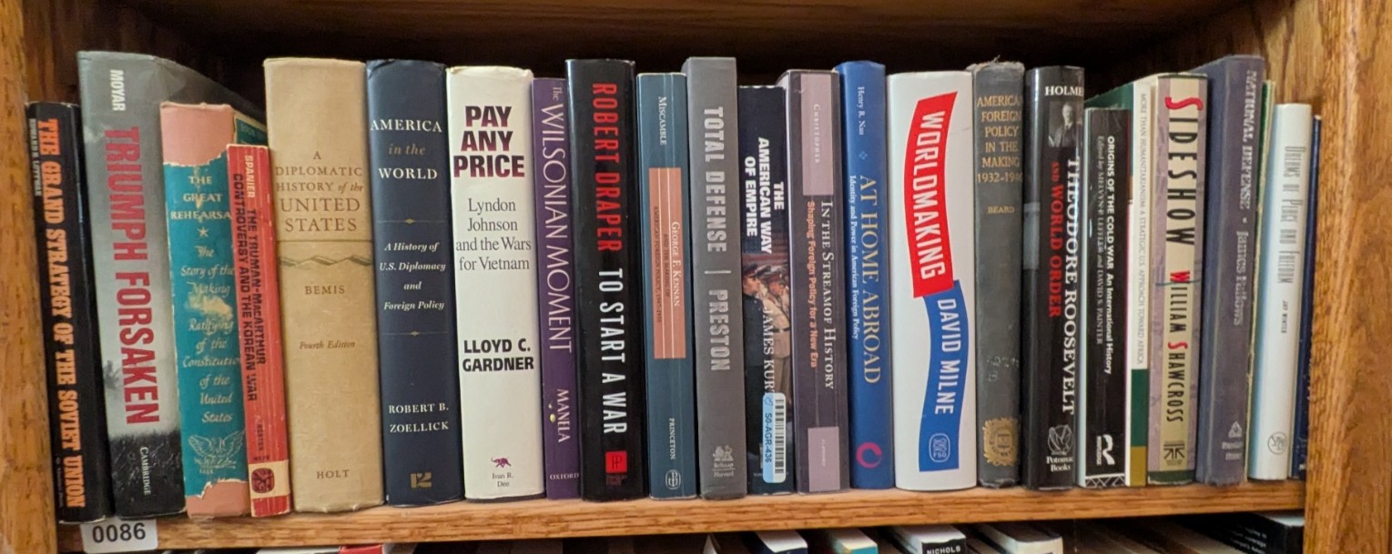 Photograph of Shelf 86; books are listed in top-to-bottom order alongside the photograph.