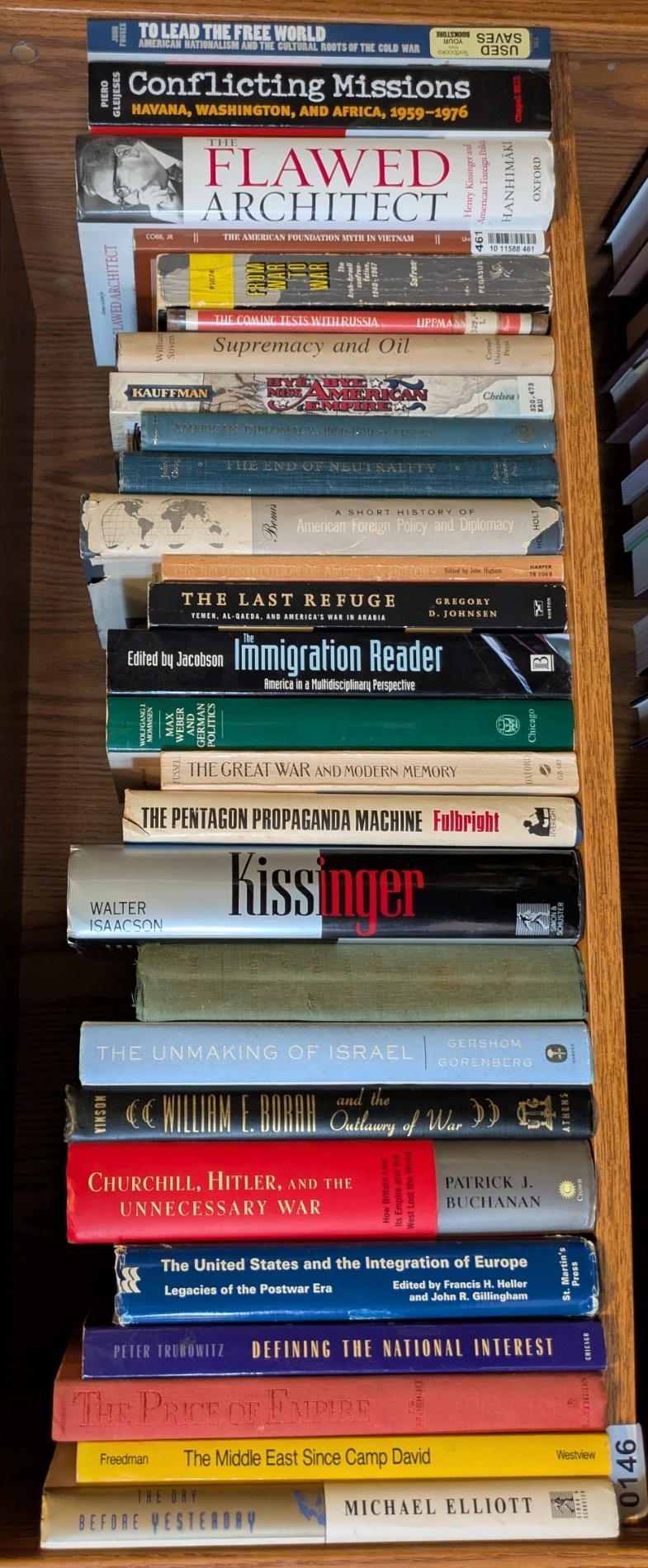 Photograph of Shelf 146; books are listed in top-to-bottom order alongside the photograph.
