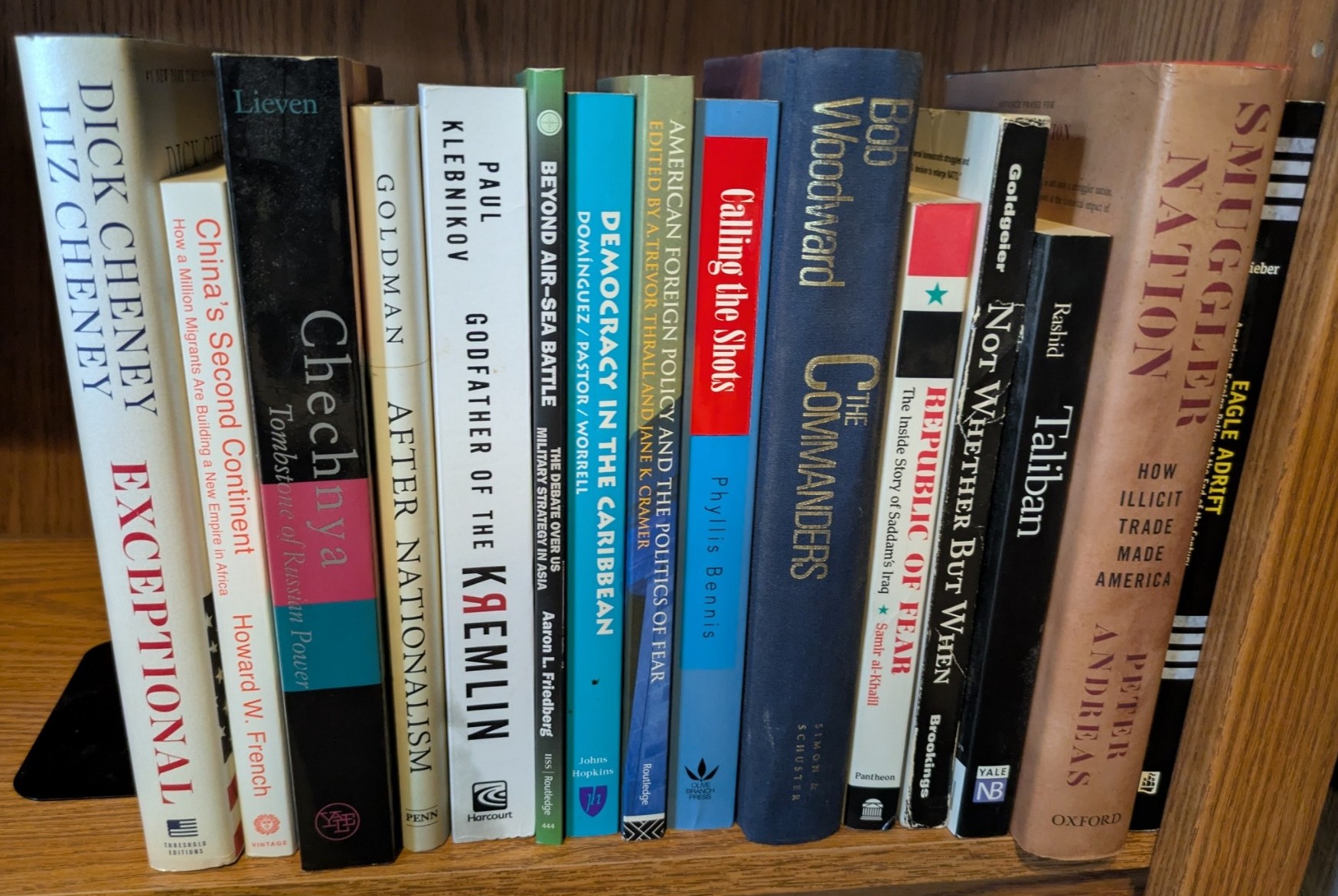 Photograph of Shelf 147; books are listed in top-to-bottom order alongside the photograph.